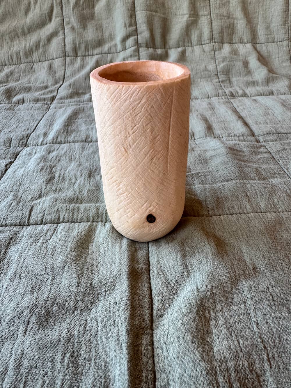 Another view of hand-carved birch cup